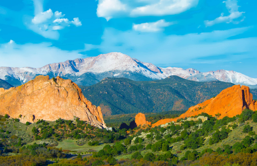 Beautiful Garden of the Gods in the foreground, and Pikes' Peak covered in scant snow in the background. 
